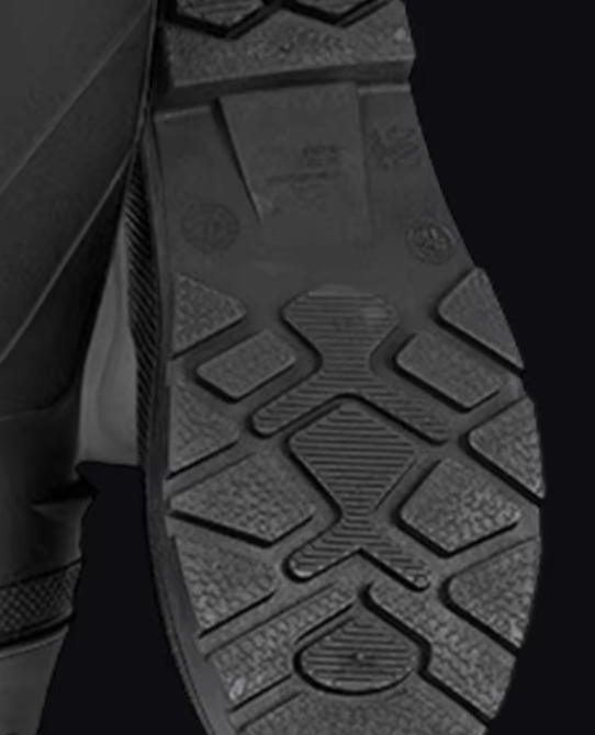 macro-detail-of-deep-tread-non-slip-sole-for-mens-outdoor-fishing-work-boots